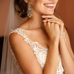woman smiling in a wedding dress