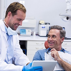 Man smiling at dentist in Newburyport