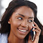 woman talking on phone and smiling
