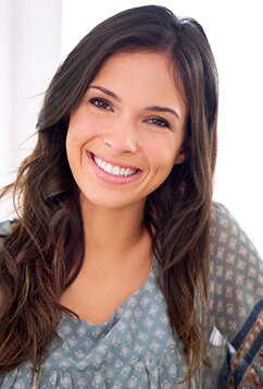 woman with perfect smile smiling at camera