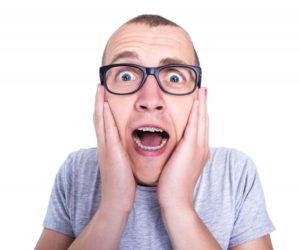 man screaming with glasses