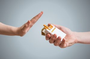 hand up denying cigarette offer