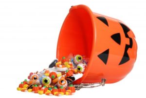 Halloween bucket full of candy.