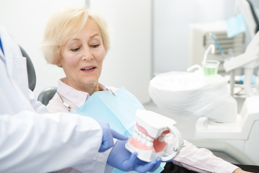 patient attending dental checkup with dentures in Newburyport