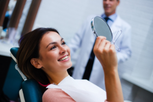 a patient visiting her dentist for a filling